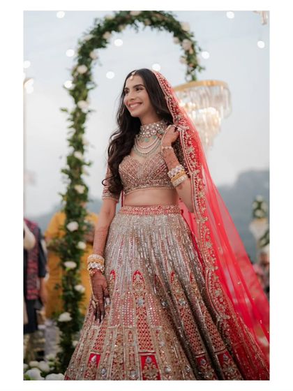 A close-up of the bride on her wedding day, her happy and radiant smile capturing the excitement of the moment.