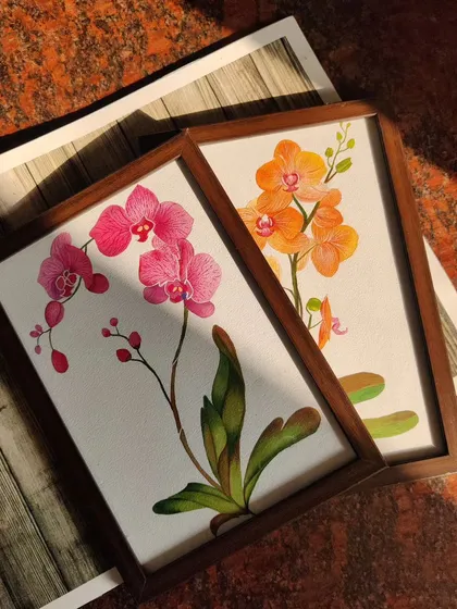 Seeing my art find a home is the best feeling. Here are two of my watercolor orchid paintings, framed and ready to hang. I offer my botanical illustrations as finished art pieces that can bring a touch of elegance and nature into your home decor.
