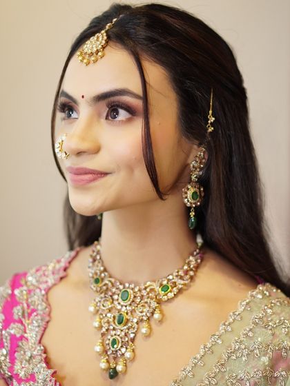 Radiance in every detail. For Likitha, we chose soft shimmer on the eyes, flushed cheeks, and a velvet matte lip to enhance her natural charm with a perfect hint of glam.