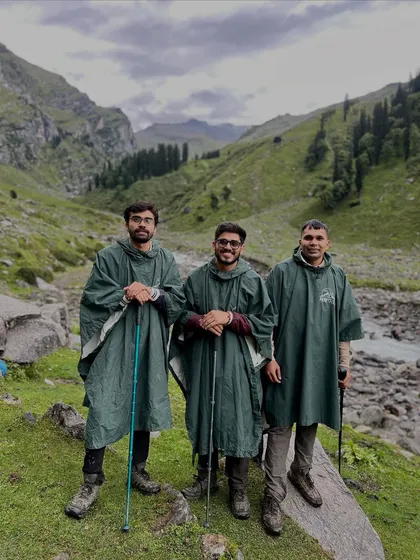 Geared up in ponchos, ready for whatever the mountain throws at us. The weather can be unpredictable, but the spirit is always high.