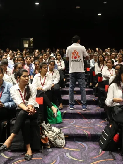 Addressing the audience at a college workshop. My mission is to empower every individual with the knowledge to defend themselves.