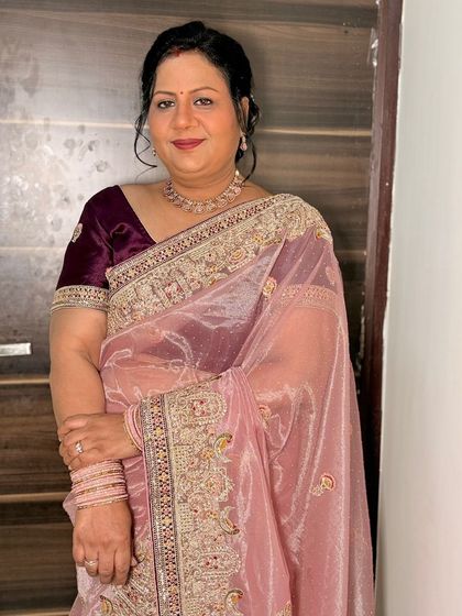 A smiling portrait of the client.