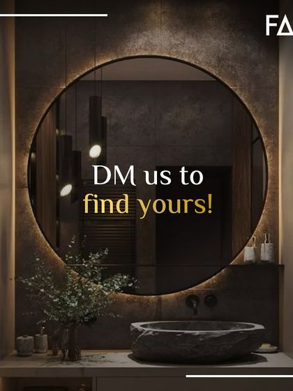 After exploring the different styles, from bold to minimalist, I am here to help you find the perfect one. This image, with its warm lighting and natural stone sink, invites you to start the conversation.