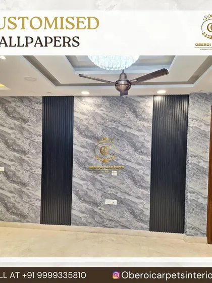Here, I've used a grey marble-effect custom wallpaper as the main feature, with two vertical sections of black fluted panels to add structure and contrast. This combination creates a bold and modern statement wall.