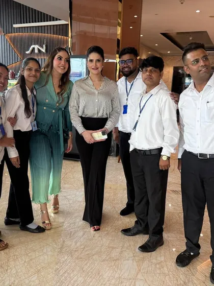 Posing with Zareen Khan and the event team. It's wonderful to be surrounded by such positive energy.