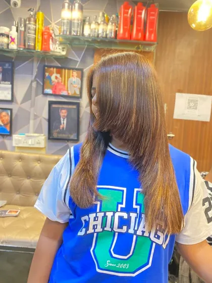 The finished balayage look, full of shine and dimension. This is a perfect way to refresh your look without a drastic change.