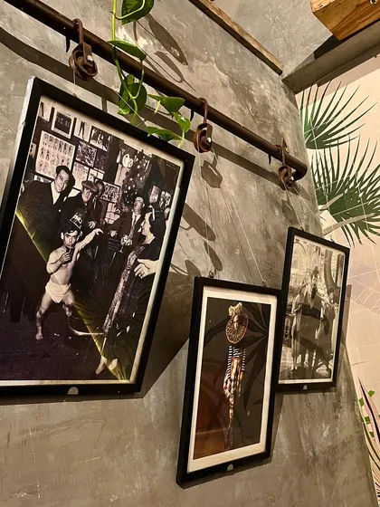 The decor at my place is a mix of modern and vintage, with cool black and white photos hanging on a rustic wall.