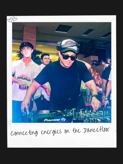 "Connecting energies on the dancefloor." A polaroid-style shot capturing a candid moment from a college gig.