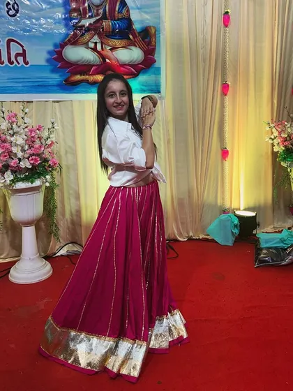 Another angle of my performance look, showcasing the traditional jewelry and happy vibes.