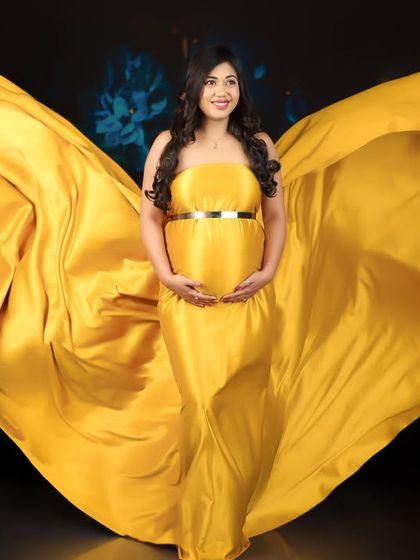 This series showcases my artistic fabric draping service, using a brilliant yellow fabric to create stunning, wing-like effects and elegant silhouettes.