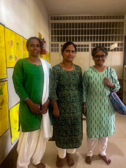 Three teachers from Senthil Public School, dressed in matching colors, stand together proudly. Our year-long course fostered a strong sense of community and shared purpose among the staff.
