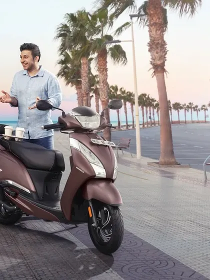 This scene for the TVS Jupiter ad was set up to look like a casual, happy conversation on a seaside promenade. It highlights my ability to create natural and engaging interactions on camera.
