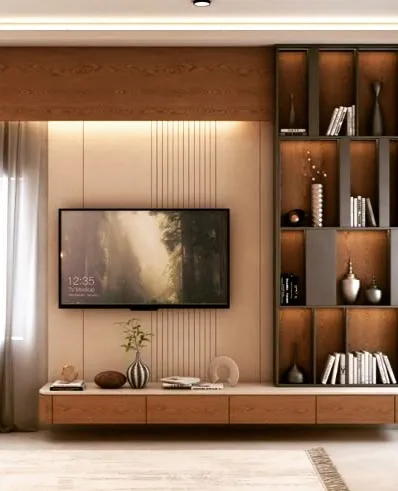 A contemporary TV unit combining a floating wooden console with a tall, integrated bookshelf. The back panel features vertical grooves and soft backlighting, adding texture and depth to the living room wall.