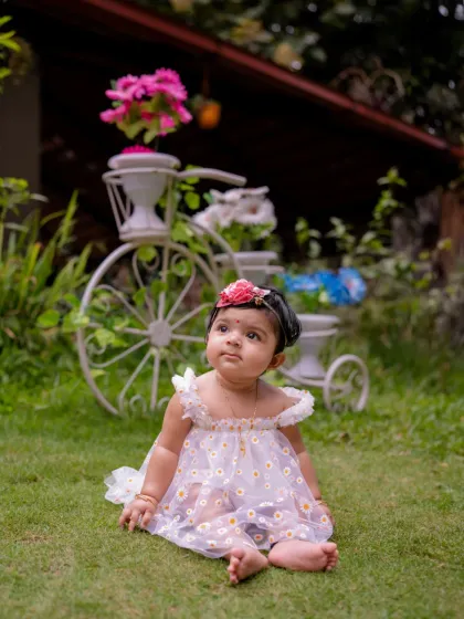 The cutest little daisy in the garden of life. We find beautiful spots for our outdoor baby photoshoots.