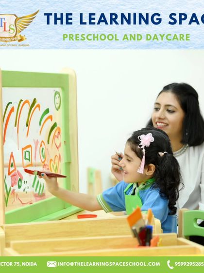 A teacher and child engaged in a creative activity in our art studio. This space is designed to be a canvas for imagination, where every child can feel like a little Picasso.