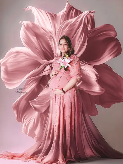 In my studio, we can create fine art portraits that look like they're straight out of a painting. This session uses a stunning floral fabric backdrop to create a soft, romantic, and artistic memory.