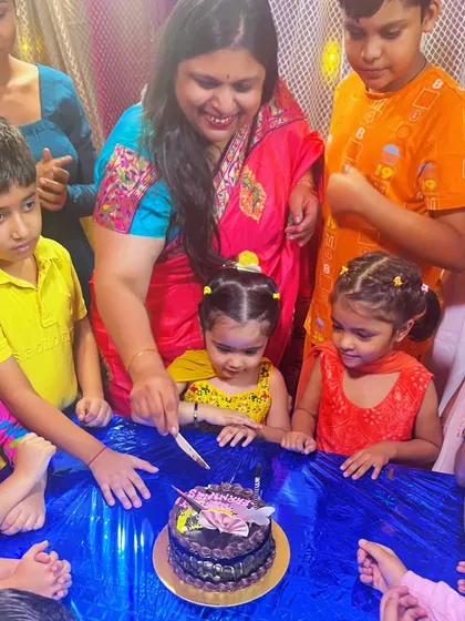 Cutting our 6th-anniversary cake with my wonderful students. They are the heart of Saraswatei Learnings.