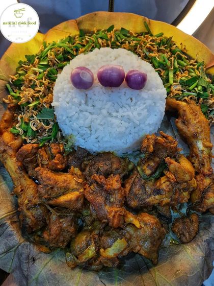 Country chicken stir fry served with a spicy chives mimi singju. The aroma from the lotus leaf adds a special touch to this dish.