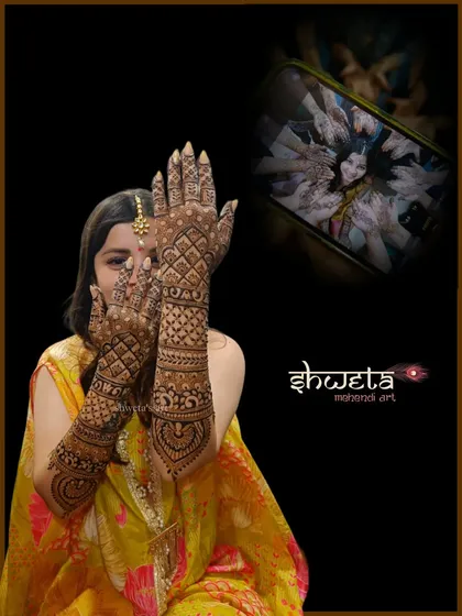 A beautiful back-hand design for a bride. The intricate jaali pattern and heart motif create an elegant and modern look while still providing full coverage.
