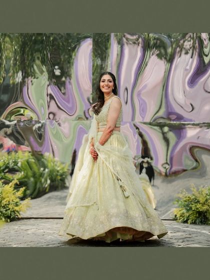 A fun portrait of the bride against a distorted, reflective background, adding an artistic and modern touch.