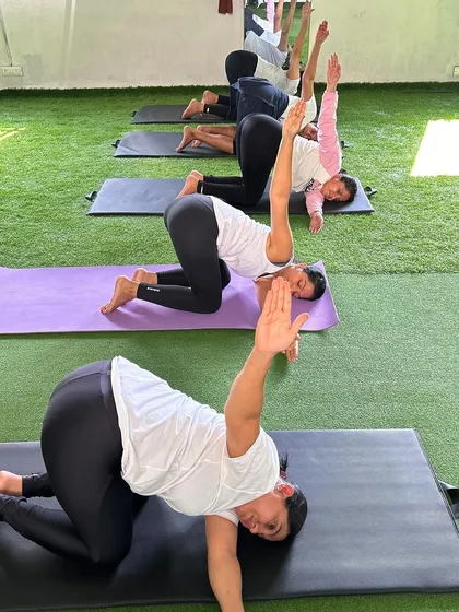 Celebrating International Yoga Day with a special session focusing on spinal twists and flexibility.