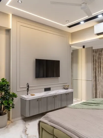 Where sleek sophistication meets playful energy. This contemporary TV wall, finished with a luxe blend of acrylic laminate and PU finish, uses elegant grey tones to keep the space bright, dynamic, and effortlessly stylish.