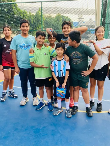 It's not just about drills; it's about building friendships. Our junior players celebrating a fun and productive morning session together, fostering team spirit from a young age.