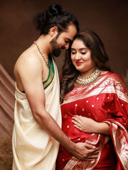 An intimate portrait celebrating love, heritage, and new life. The traditional attire adds a beautiful layer of meaning to this special maternity session.