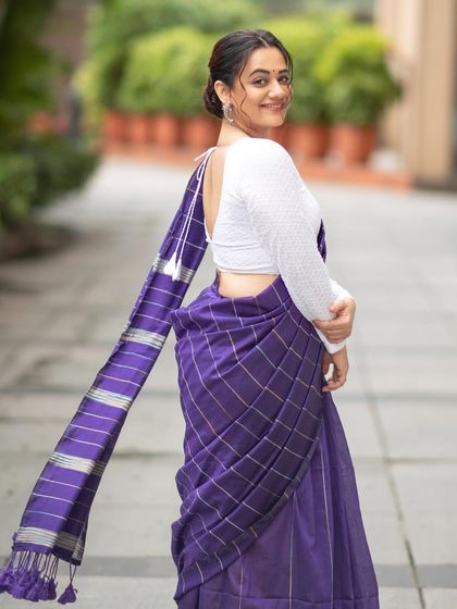 The back detail of the blouse and the beautiful fall of the saree's pallu were key elements of this look for Spruha Varad.