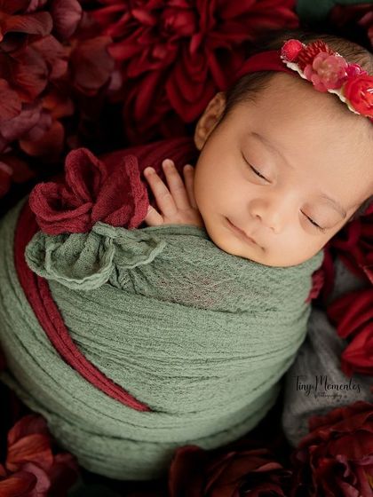 Another angle from our red floral setup, showing the baby peacefully sleeping. I use different perspectives to capture a variety of beautiful images from a single theme.