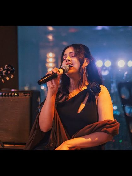 Singing my heart out at the St. Regis. Every corporate event is an opportunity for us to share our passion and create a memorable atmosphere.