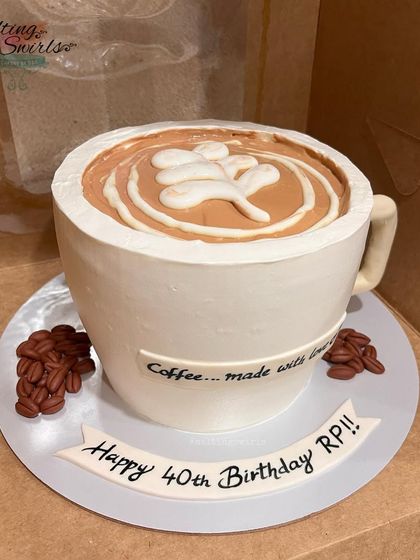 A cake designed to look like a coffee cup, filled with a delicious chocolate cake. This was a last-minute request that we were happy to take on for a coffee enthusiast's 40th birthday.