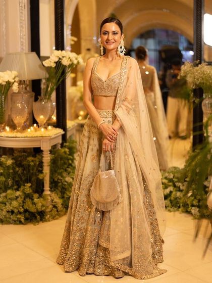 A full-length shot of our client at a designer store launch. We provided a complete hair and makeup look that was sophisticated and glamorous, fitting for a high-profile evening event.