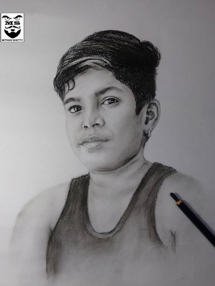 A commissioned charcoal portrait of a young boy. I take care to capture the youthful features and innocent expression in my drawings of children.