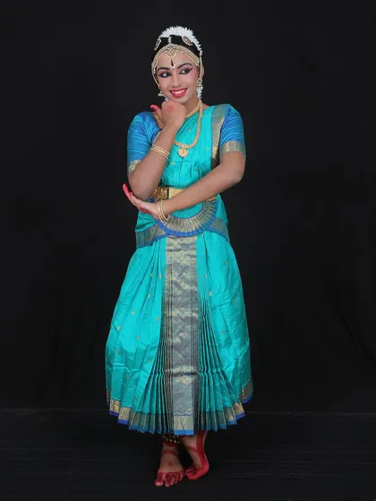 14-year-old Veevika put in her best effort to complete her Arangetram. This portrait captures her youthful grace and the dedication she brought to her performance.