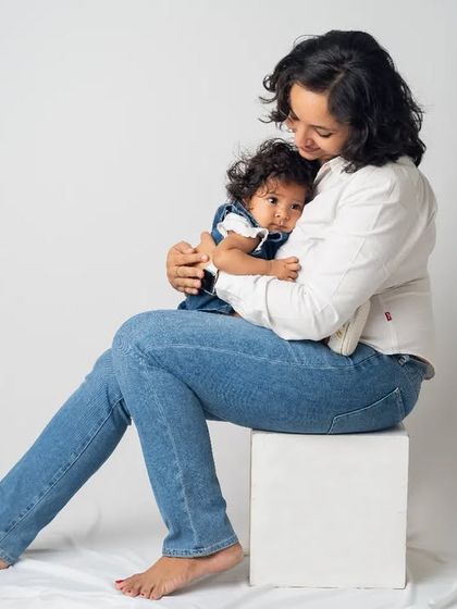A quiet, tender moment between a mother and her baby. Even in a full family session, we make sure to capture these individual connections that are so precious.