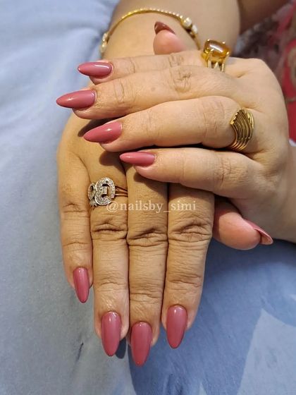 Loving this dusty rose shade lately. A simple, single-color manicure in a chic almond shape.