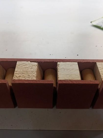 Another view of the saw till, showing how the different-sized slots can accommodate various tools.