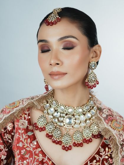 Another angle showing the beautiful eyeshadow work with eyes closed. This is crucial for bridal photography, and a technique we practice extensively.