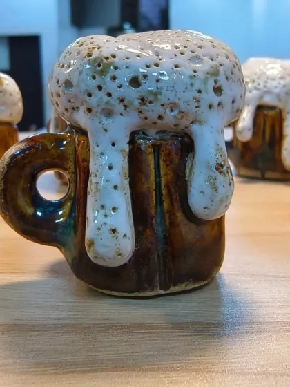 Another view of the handcrafted miniature beer mug. Creating small, detailed objects like this is a great way to hone your sculpting skills and patience.