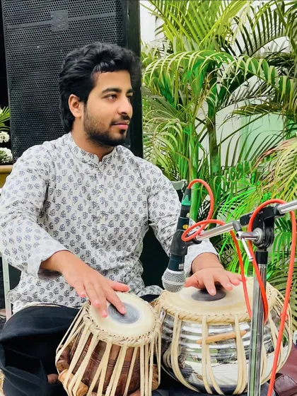 A candid moment, listening to the other musicians during the concert.