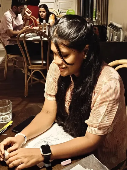 A candid shot of an artist at work during a workshop. I love the atmosphere of concentration and creativity.
