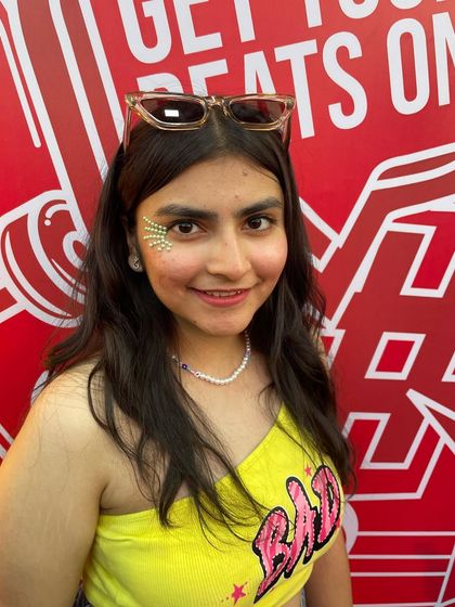 A front-facing view of the star glitter design. The iridescent glitter shines with different colors as it catches the light.