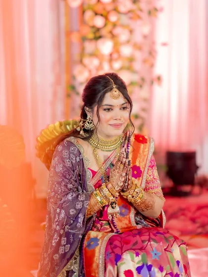 A moment of prayer and gratitude. The soft, elegant makeup complements the solemnity and beauty of the traditional ceremony.