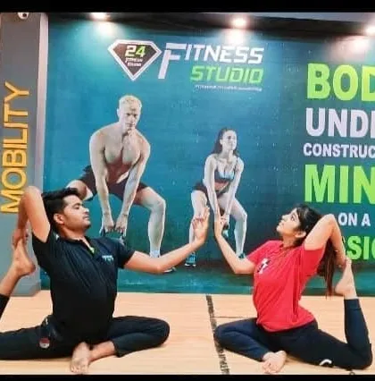 Partner yoga practice with Eka Pada Rajakapotasana (One-Legged King Pigeon Pose). These exercises are great for building trust and connection within a group.