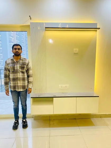 Standing next to the completed small TV cabinet, a perfect solution for a bedroom or a small living area.