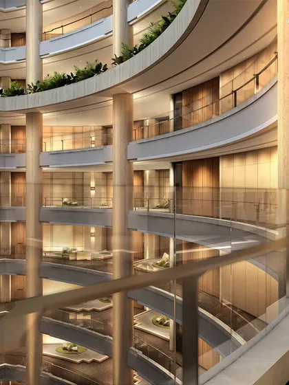 Another perspective of the grand atrium at Palais Royale, where curved balconies and structural columns create a mesmerizing pattern. The design emphasizes innovation and luxury, redefining the skyline of one of India’s most dynamic cities.