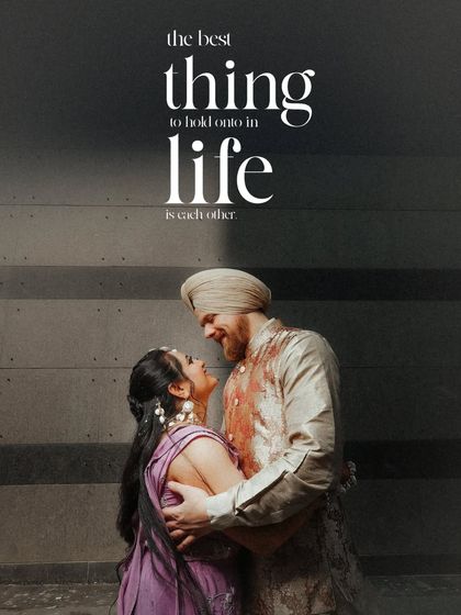 "The best thing to hold onto in life is each other." A powerful and artistic portrait of the couple in a close embrace, their love warming the cool, modern backdrop.