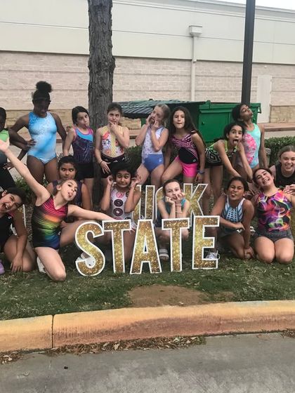 Fun & Fitness - Gymnastics & Tumbling Programs Team Spirit & Community photo 10