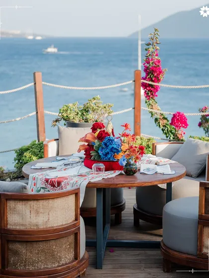 A picturesque table for two overlooking the water in Turkey. Even the smallest details are curated to create romantic and memorable moments.